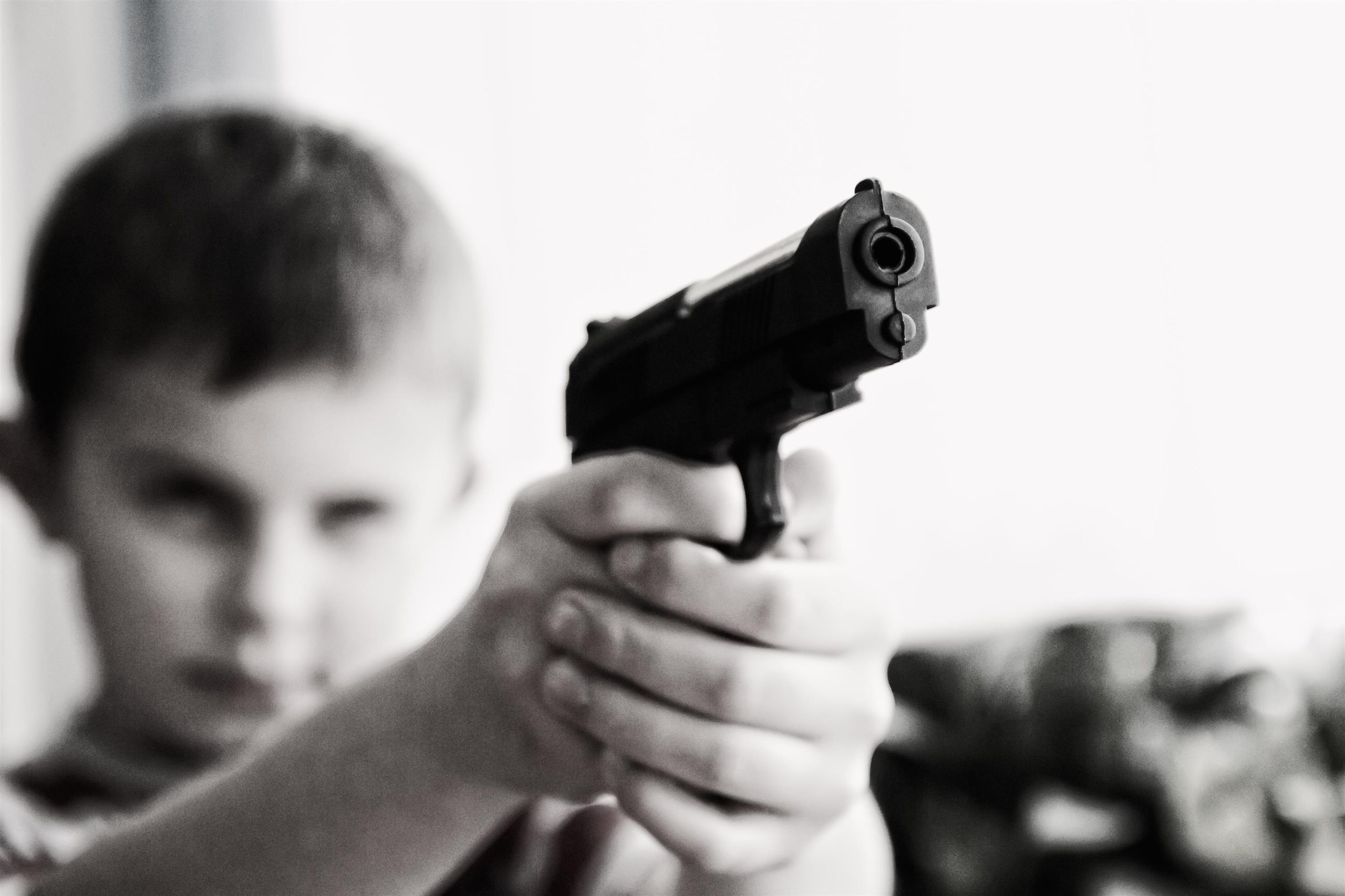 Child Access Prevention laws, child with gun, Timothy Dimoff