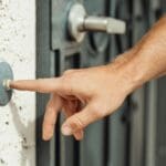 unidentified person ringing doorbell